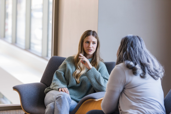 Two women are talking